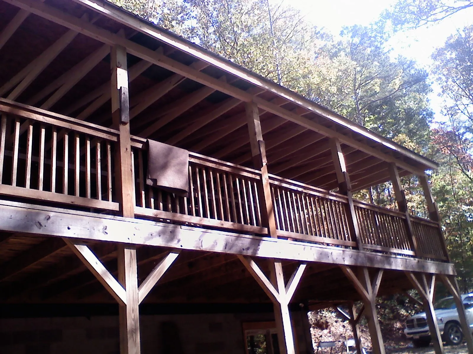 Timber framing under a new elevated porch and deck — Roof Leak Repair in Delaware by Roofing Brothers